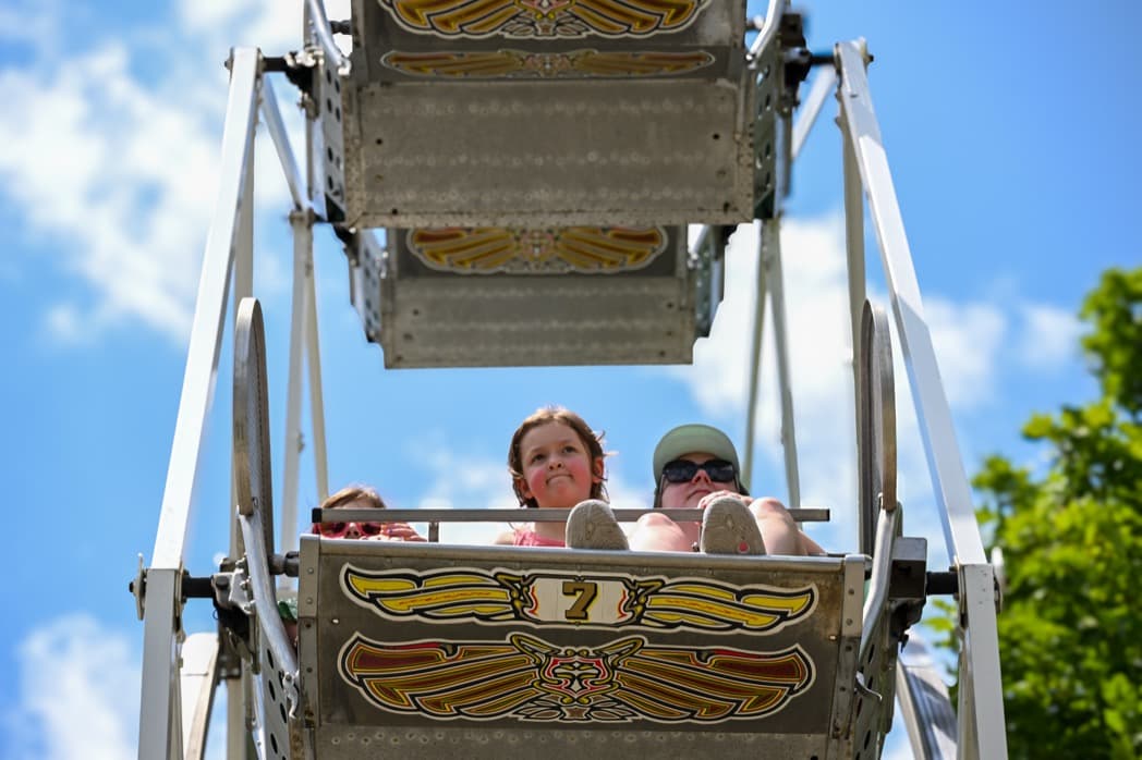 Riders on vintage ferris wheel at community festival event — Cincinnati event photographer K Dalton